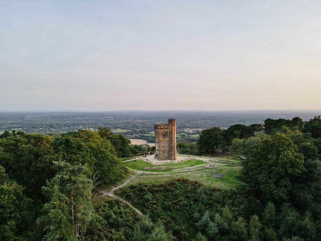 panoramic view of a castle in the middle of Surrey hills panoramic view of a castle in the middle of Surrey hills