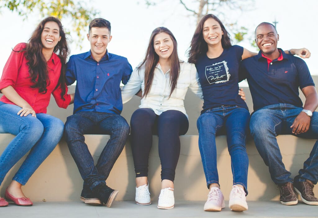 Training with Safehands Recruitment: Happy people students sitting down looking at the camera Training with Safehands Recruitment: Happy people students sitting down looking at the camera