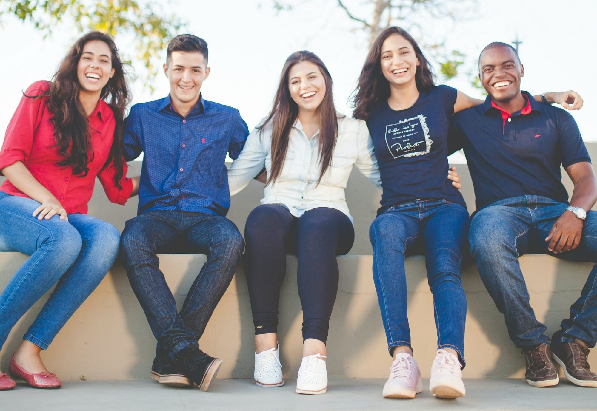 Training with Safehands Recruitment: Happy people students sitting down looking at the camera Training with Safehands Recruitment: Happy people students sitting down looking at the camera